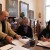 Professor of Art Sandria Hu, right, and Faculty of Fine Arts at University of Arts in Belgrade’s Dean Milutin Dragojlovic, left, sign the International Affliation Agreement. Also pictured is Bojana Buric, art historian and translator (middle).