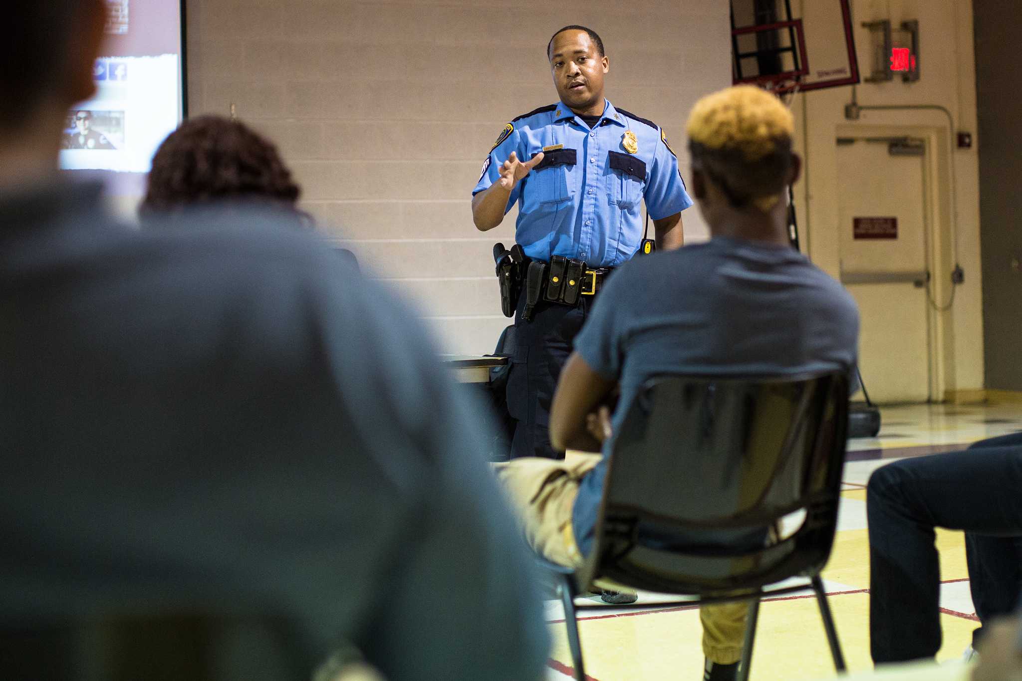 HPD Sergeant Anthony Turner talks to Beechnut Academy youth. Photo by The Signal reporter Travis Pennington.