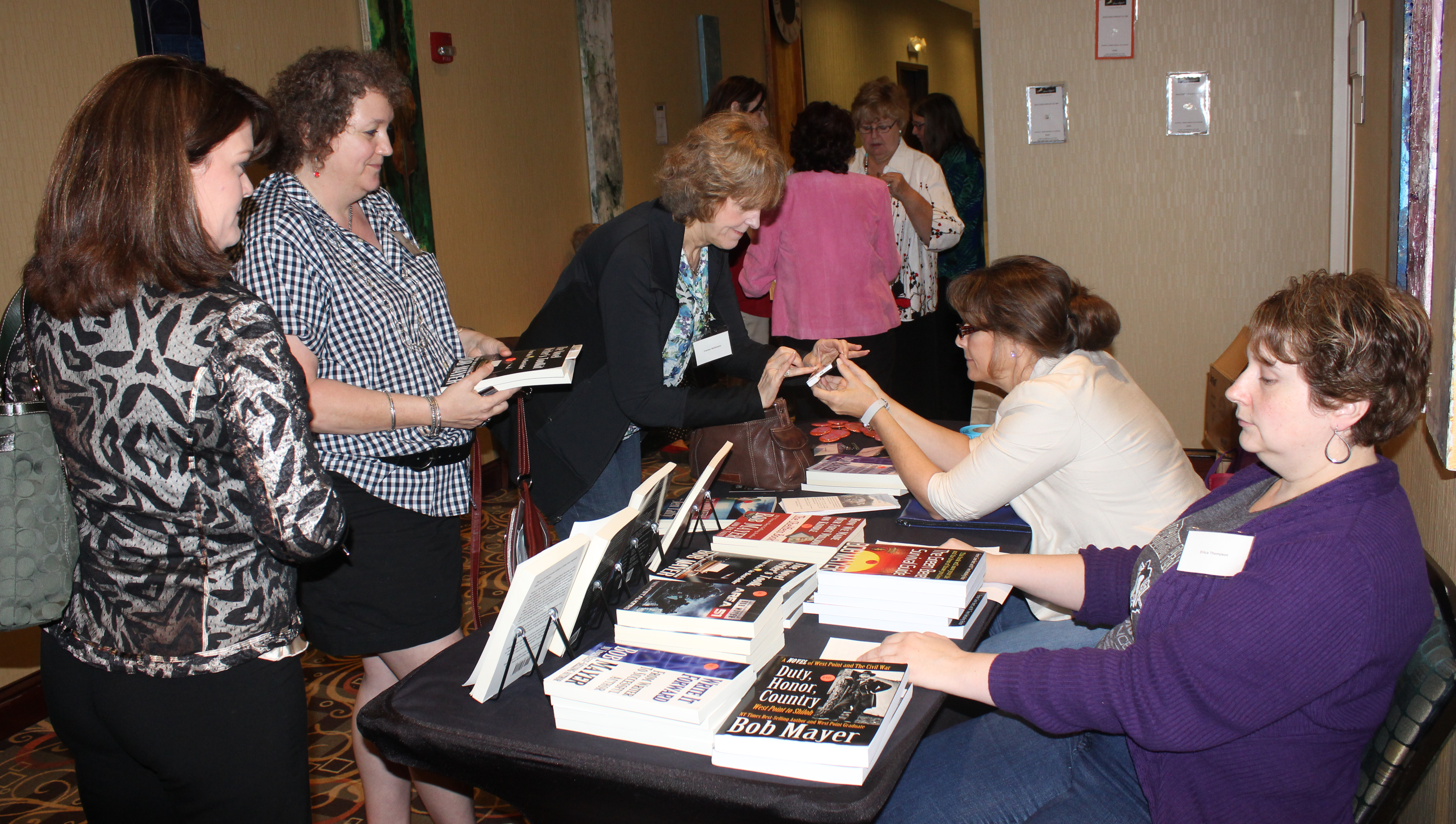 RWA members register for the annual Lonestar Writer's Conference at the check-in table.