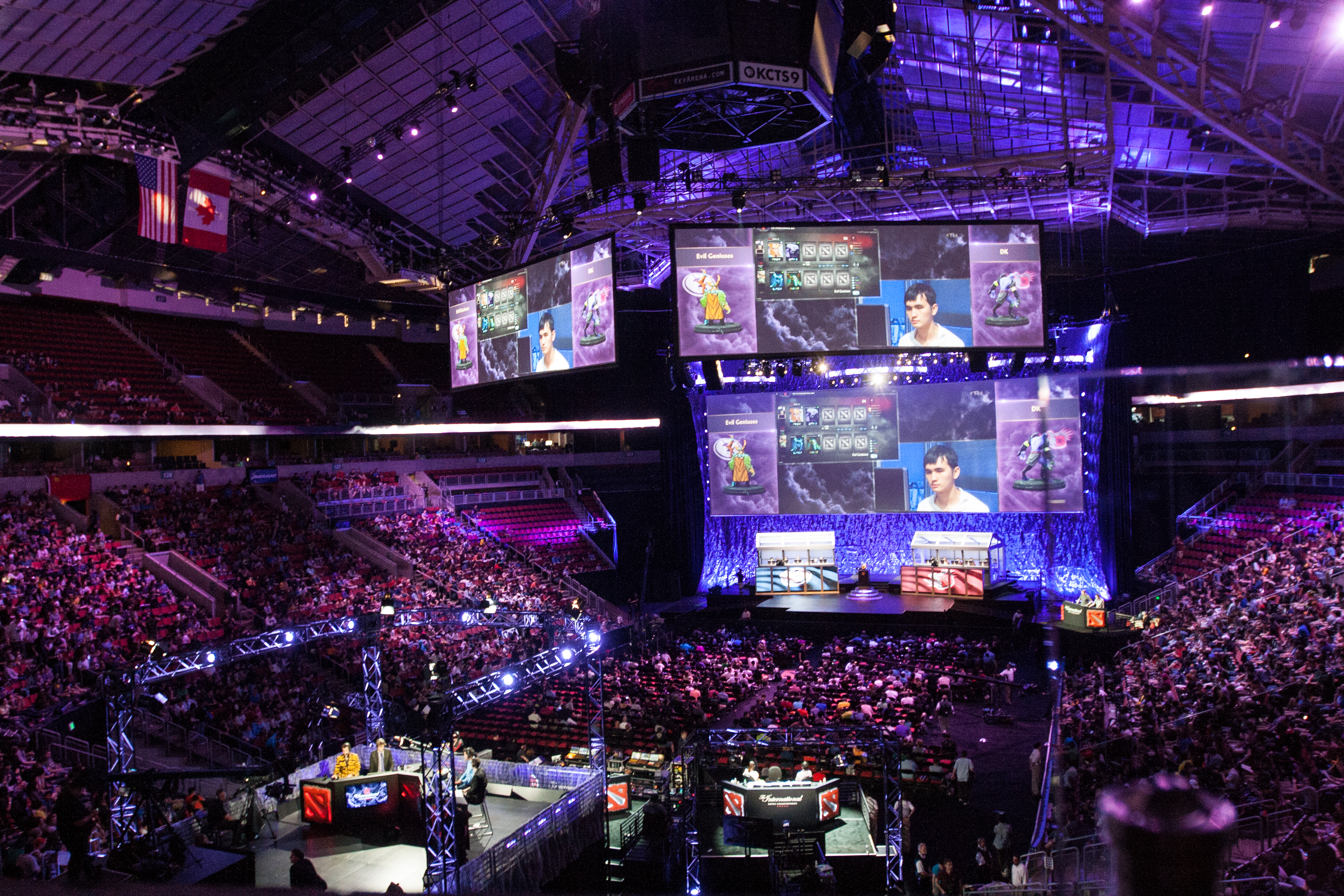 PHOTO: Stadium filled with people watching esports tournament. With over 5 million in prize money going to the winners of the International 4 event last July, five gamers became instant millionaires. This event was hosted at the Staples Center in LA. Image by Jakob Well and courtesy of the Creative Commons.