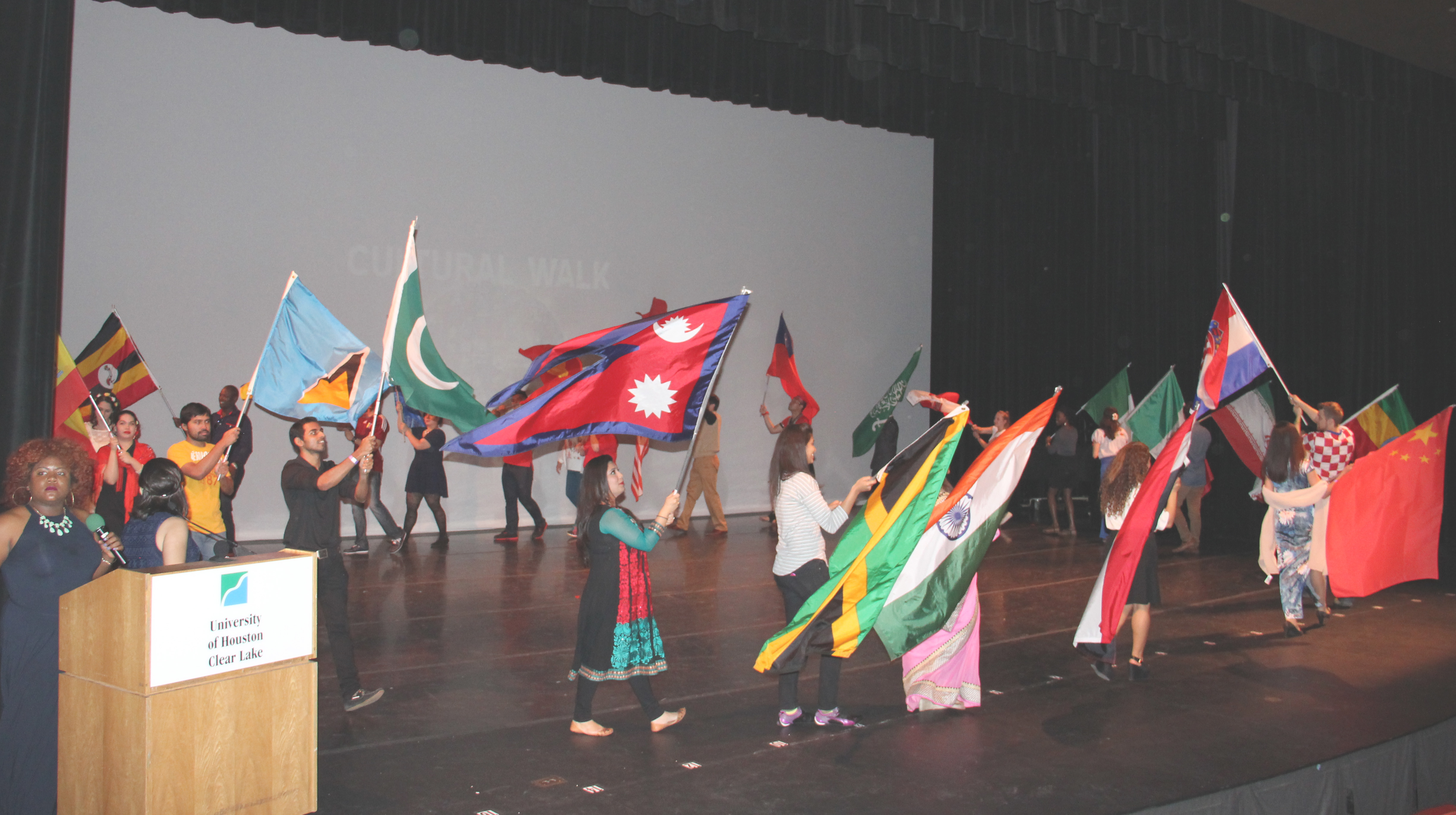 Participants of UHCL's 19th annual Cultural Extravaganza display their flags during the culture walk, which concludes the event each year.