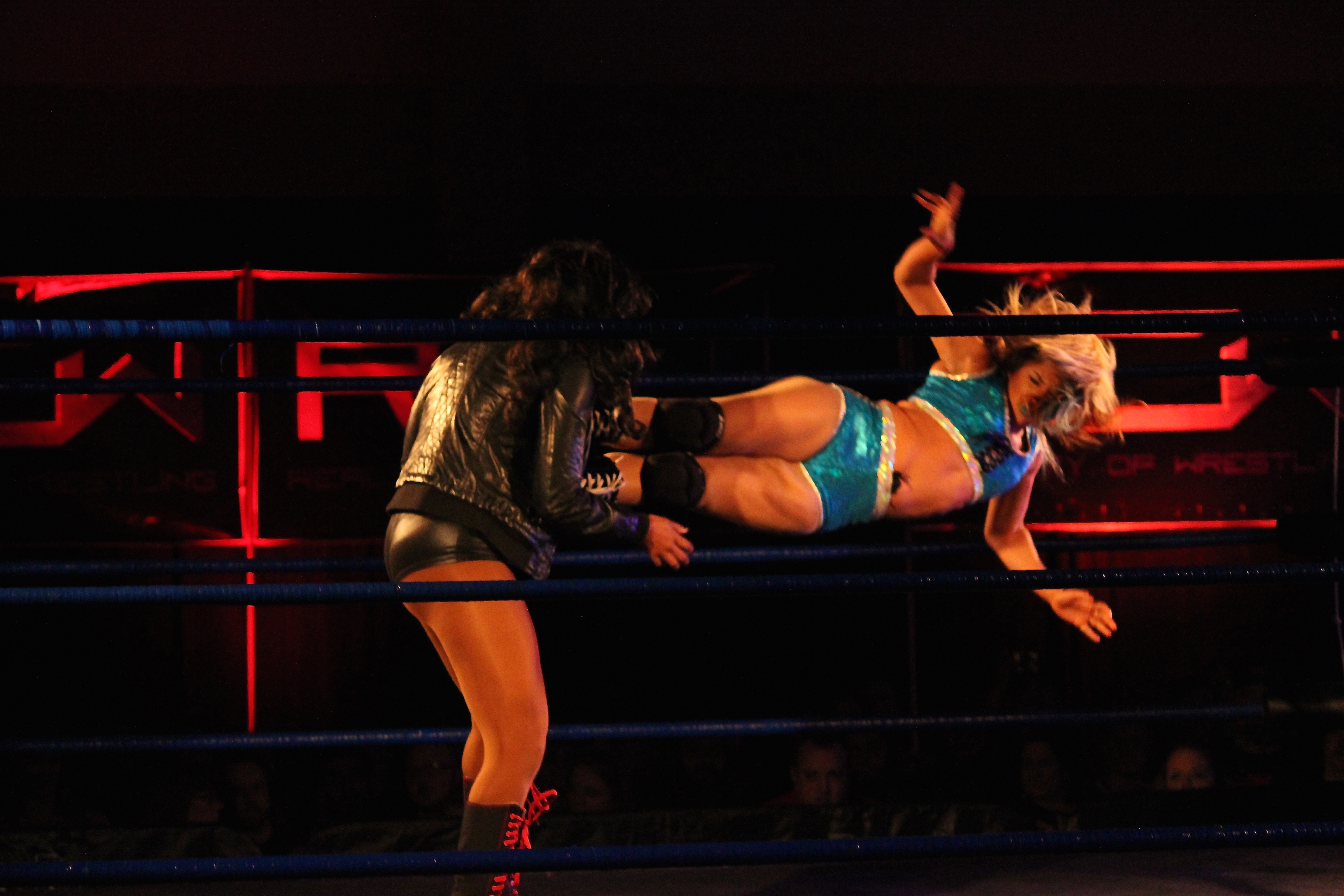 Image: Wrestler Miranda deals heavy blow to the chest of an opponent at the Sept. 13, 2015 Reality of Wrestling event. Photo by The Signal reporter Kyle Harrison.