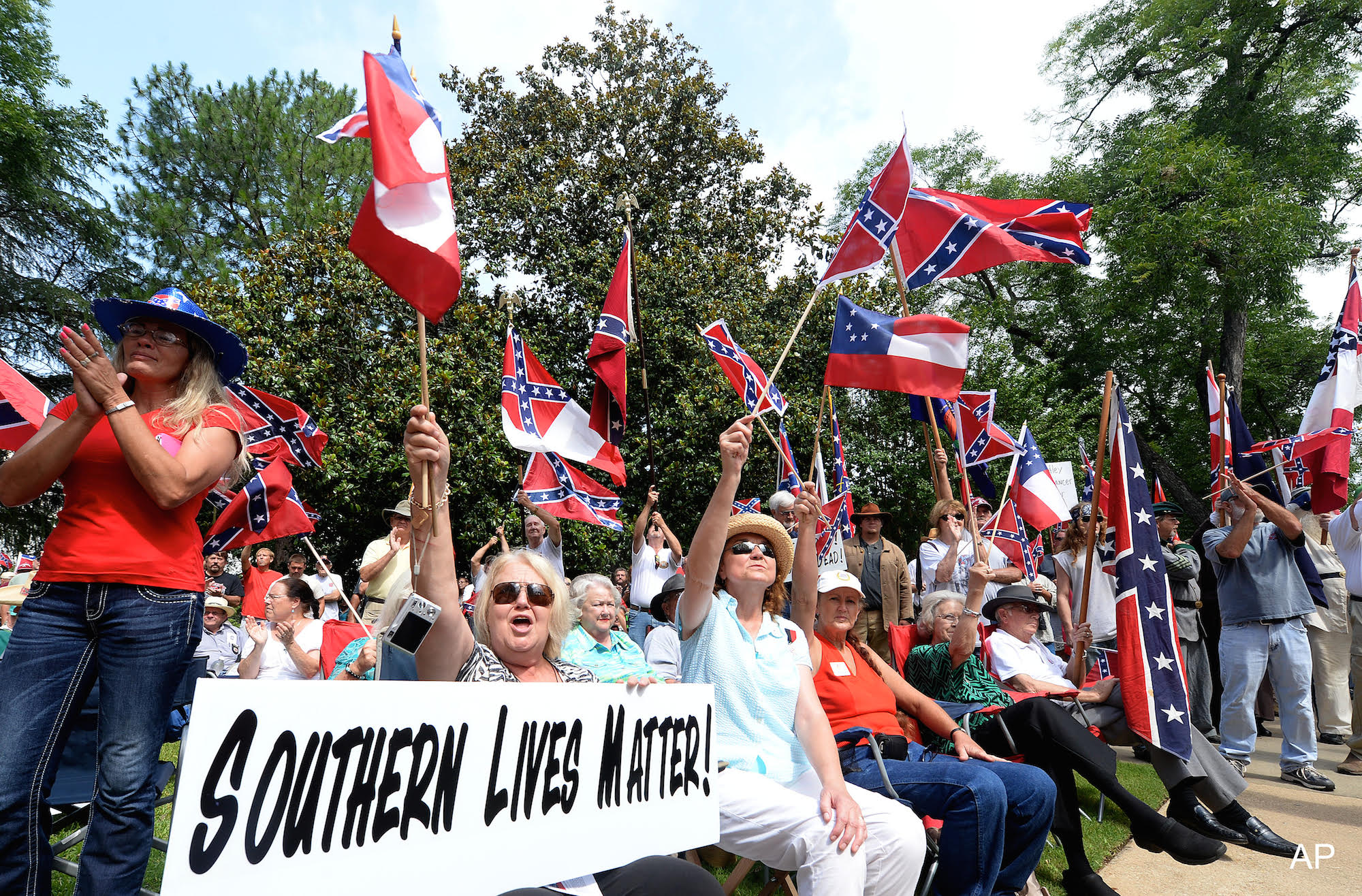 Photo: Supporters gather for a rally to protest the removal of Confederate flags from the Confederate Memorial Saturday, June 27, 2015, in Montgomery, Ala. Photo courtesy of Julie Bennett/AL.com via AP.