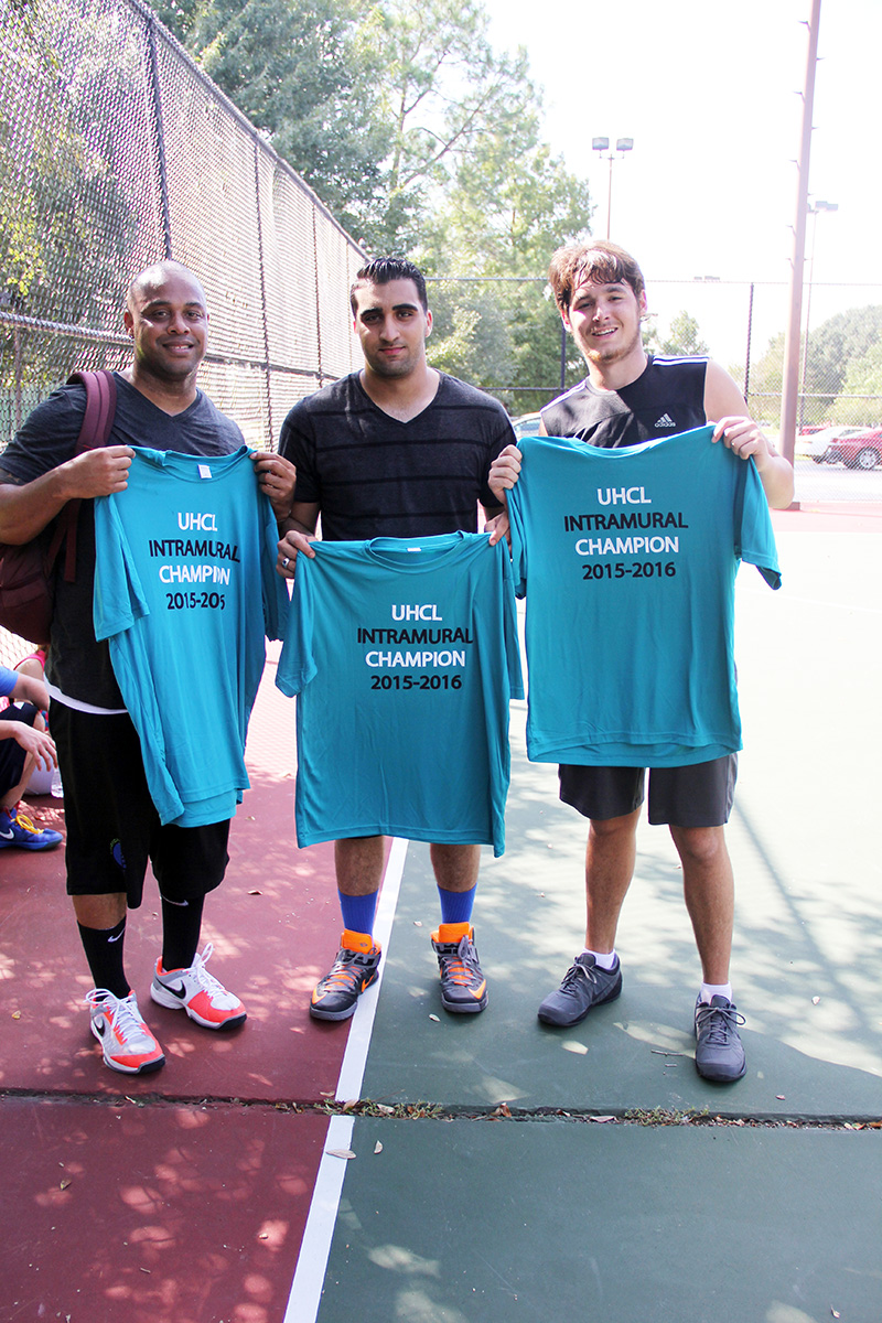 Photo: Team 1 poses after winning the championship during the 3-on-3 basketball tournament. FROM LEFT TO RIGHT: Associate Professor of Political Science William T. Hoston; sophomore Mohammad Adi; sophomore Lennon Beavers. Photo by The Signal reporter Shelby Starr.