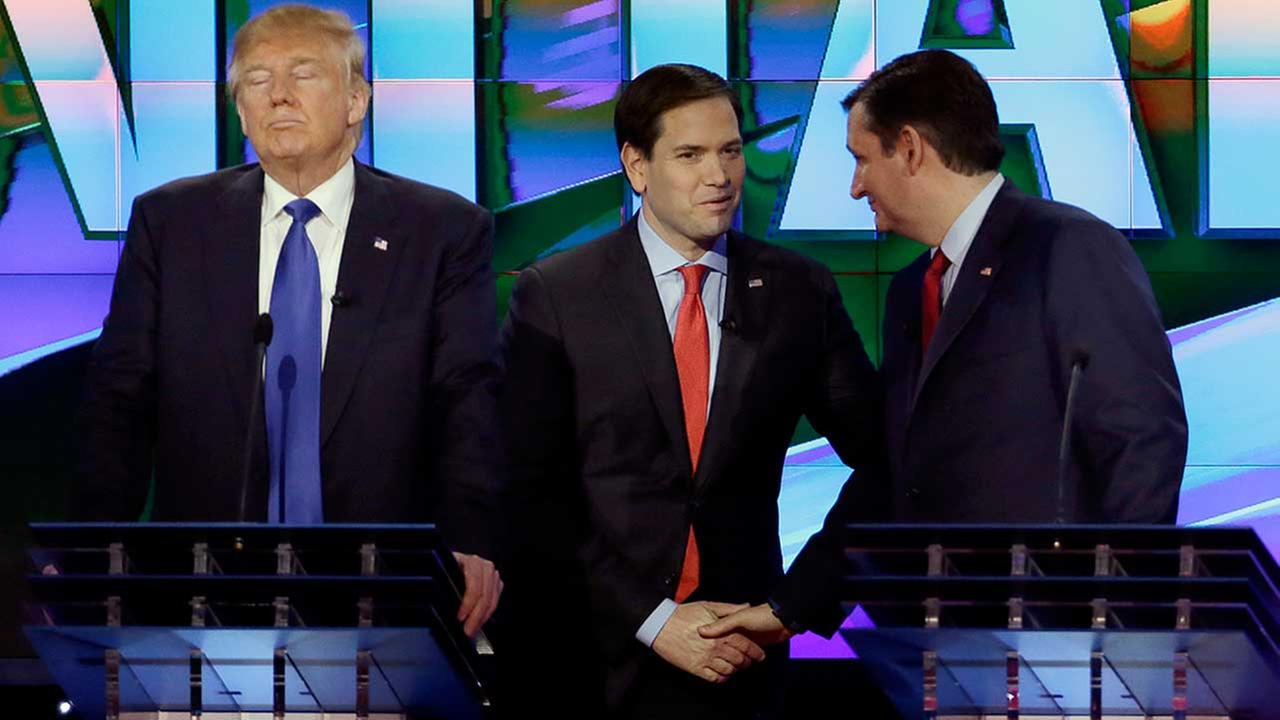 PHOTO:Rubio and Cruz shake hands as Trump looks on. Photo courtesy of ABC 13.