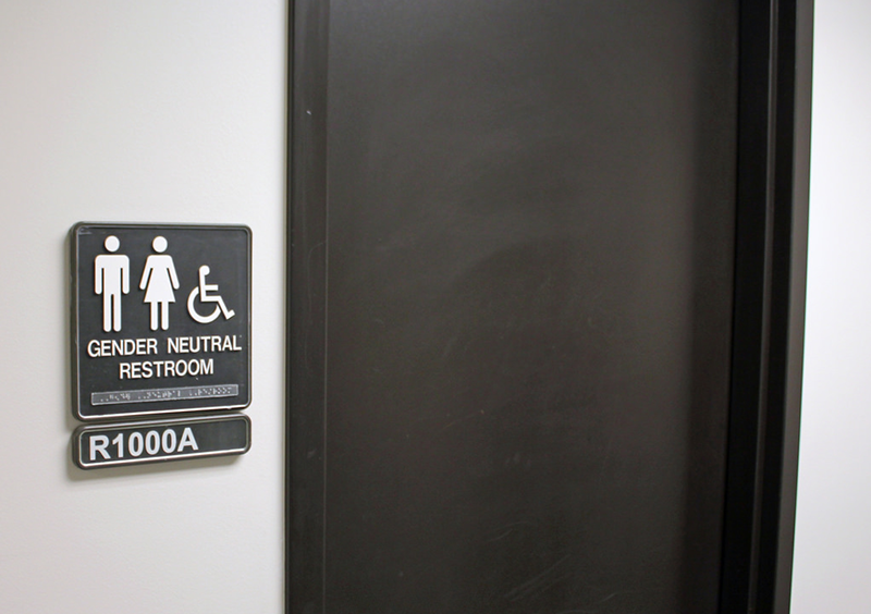 Photo of gender neutral bathroom plus sign. Photo courtesy of: Creative Commons