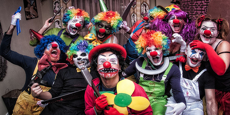 Photo: A group of clowns pose with fake weapons. Photo courtesy of: Gaudencio Garcinuño, Flickr https://www.flickr.com/photos/31112252@N00/15696955002