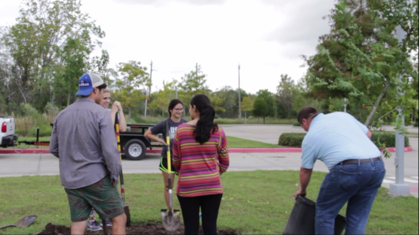 Photo: Tree planting ceremony taking place at UHCL Pearland campus. Screenshot by The Signal Reporter Aaron White