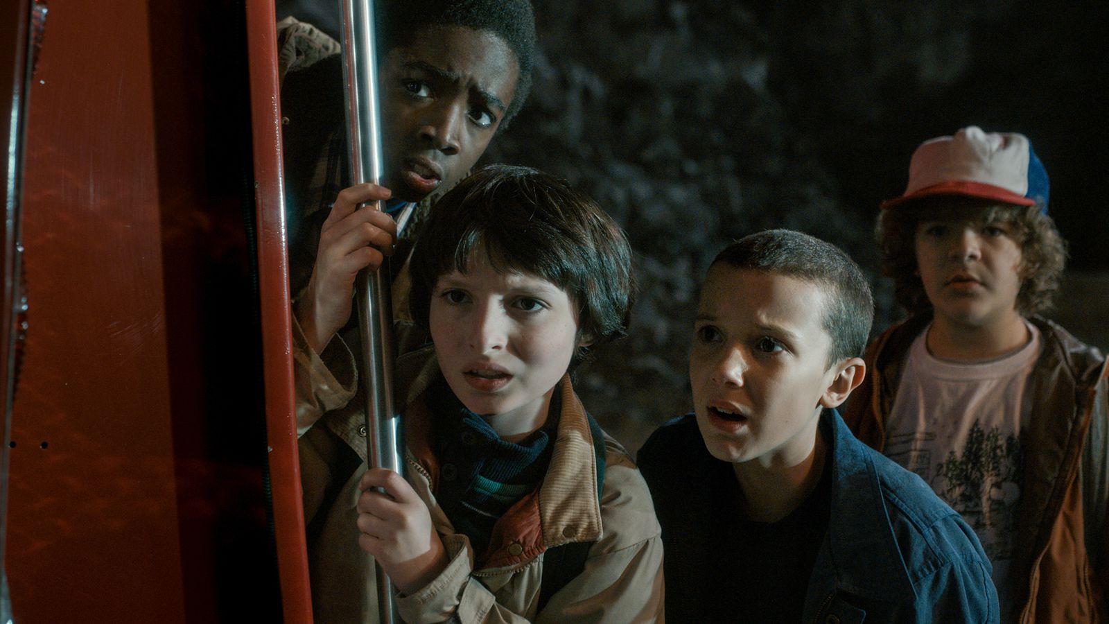 The "Stranger Things" kids as they search for their friend Will. Left to right: Lucas, portrayed by Caleb McLaughlin; Mike, portrayed by Finn Wolfhard; Eleven, portrayed by Millie Bobby Brown; Dustin, portrayed by Gaten Matarazzo. Photo courtesy of Netflix.