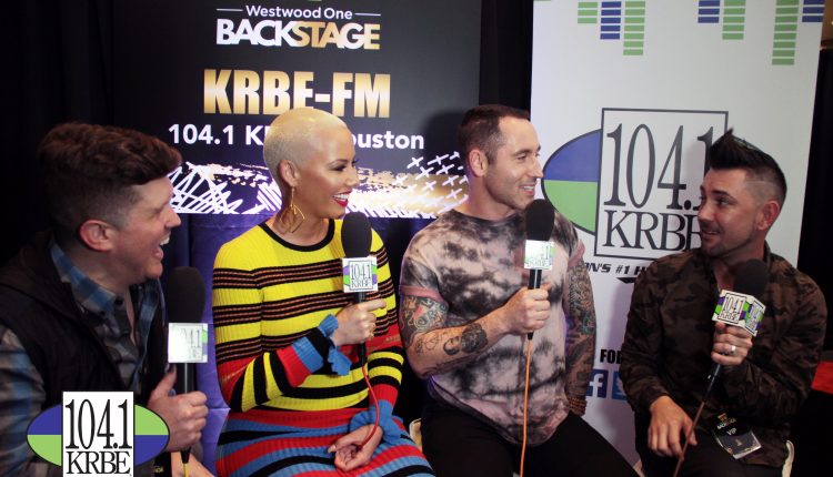 PHOTO: 104.1 KRBE DJ's Special K and Kevin Quinn interview Amber Rose on Radio Row. Photo courtesy of E.J. Santillan and 104.1 KRBE.