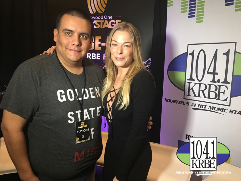 PHOTO: E.J., on radio row for the 59th Annual GRAMMY Awards, taking a photo with LeAnn Rimes