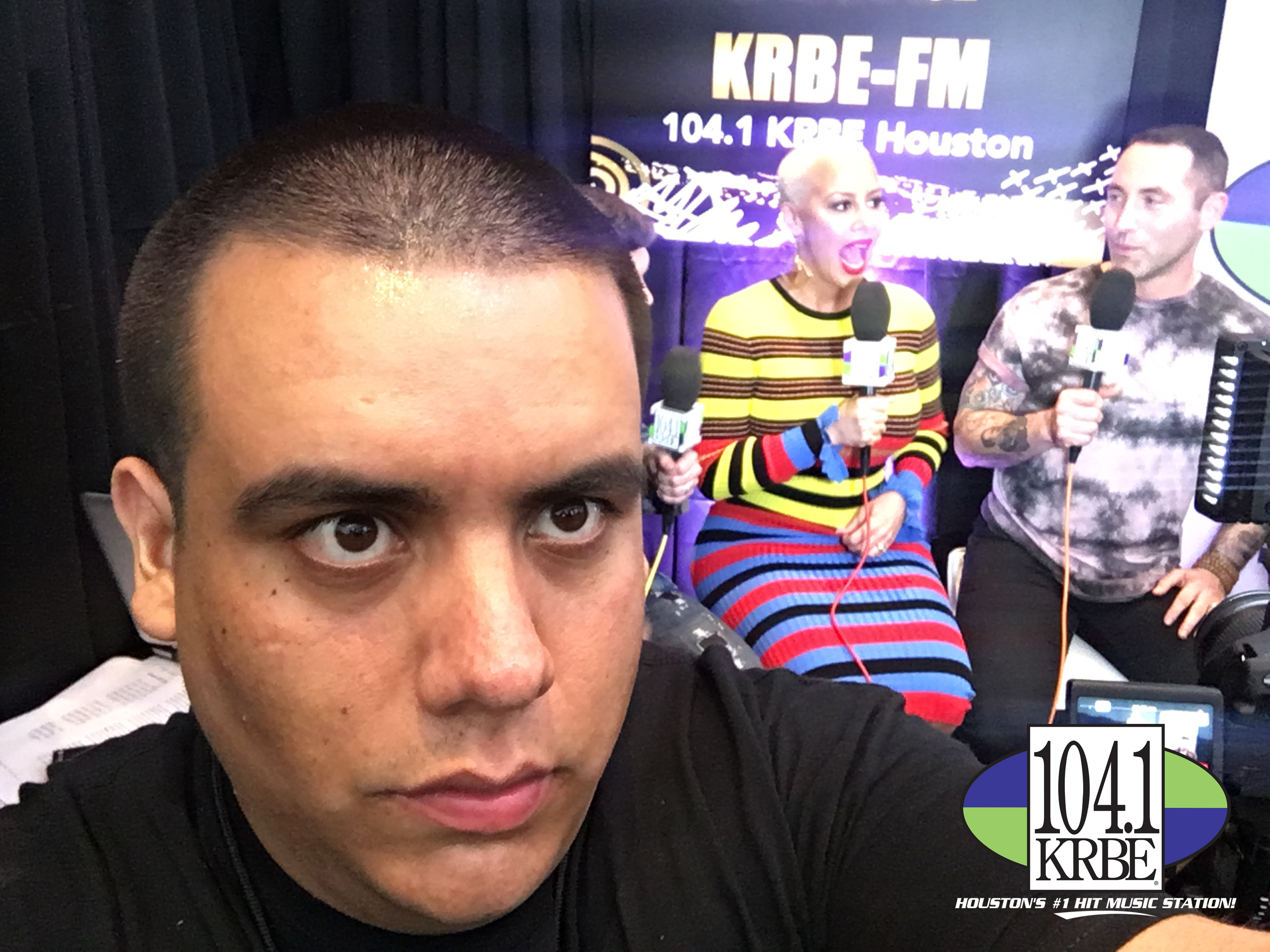 PHOTO: E.J. snaps a selfie with Amber Rose. Photo courtesy of E.J. Santillan and 104.1 KRBE.