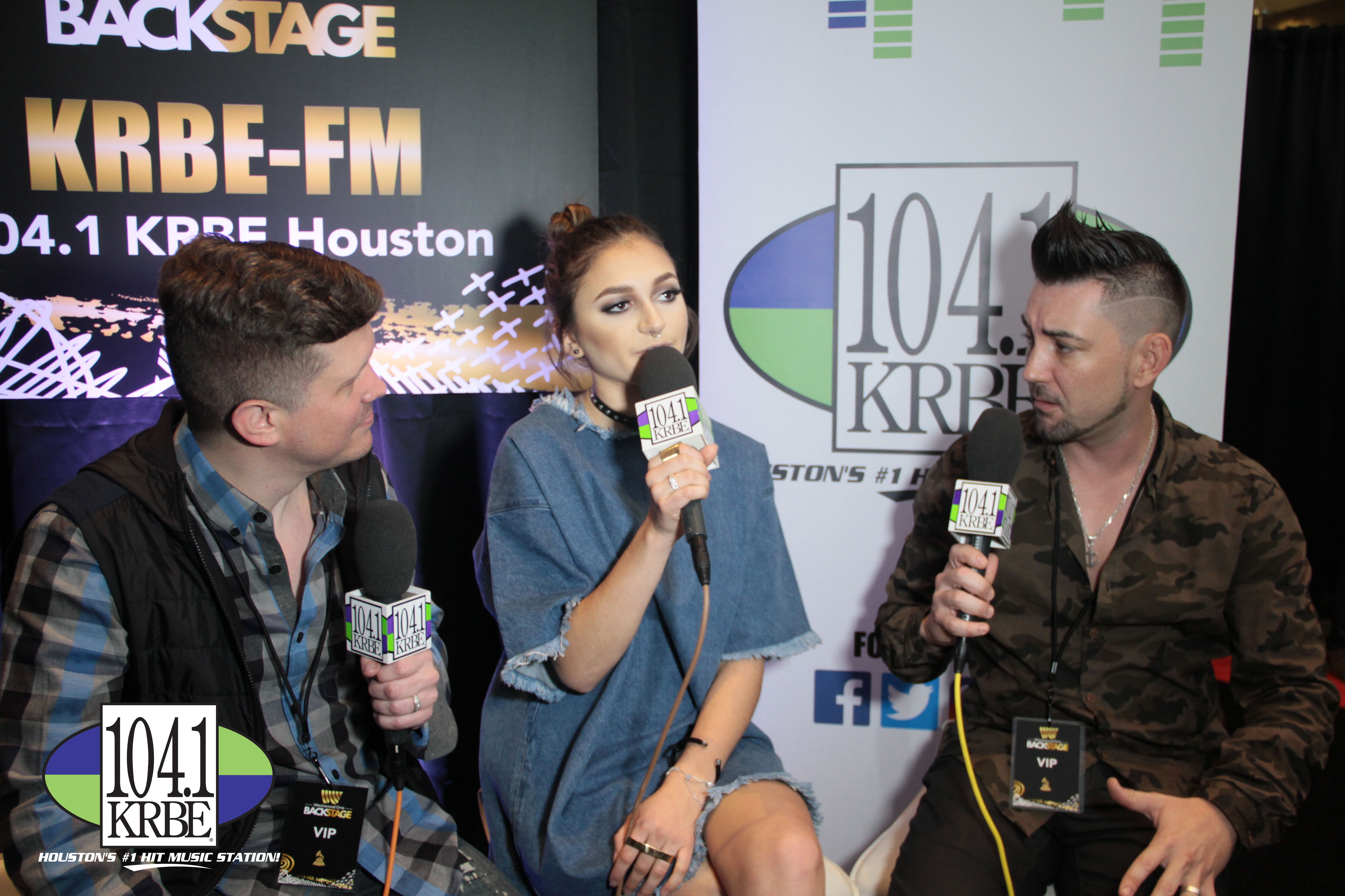 PHOTO: 104.1 KRBE DJ's Special K and Kevin Quinn interview Daya on Radio Row. Photo courtesy of E.J. Santillan and 104.1 KRBE.