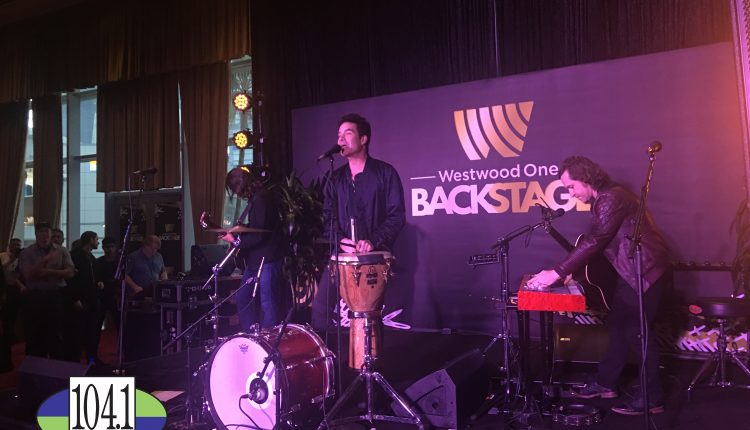 PHOTO: Train performs backstage for Radio Row attendees. Photo courtesy of E.J. Santillan and 104.1 KRBE.