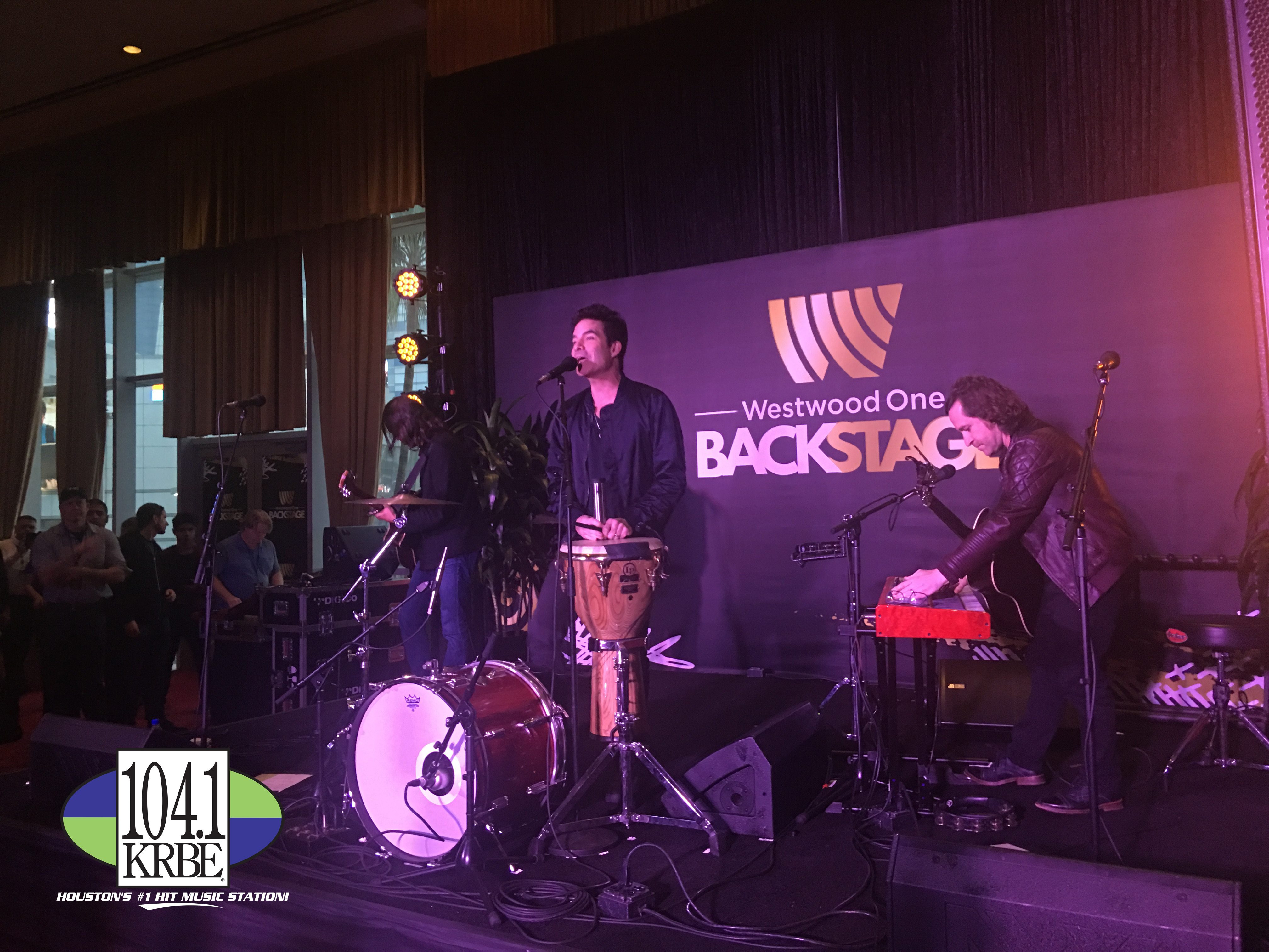 PHOTO: Train performs backstage for Radio Row attendees. Photo courtesy of E.J. Santillan and 104.1 KRBE.