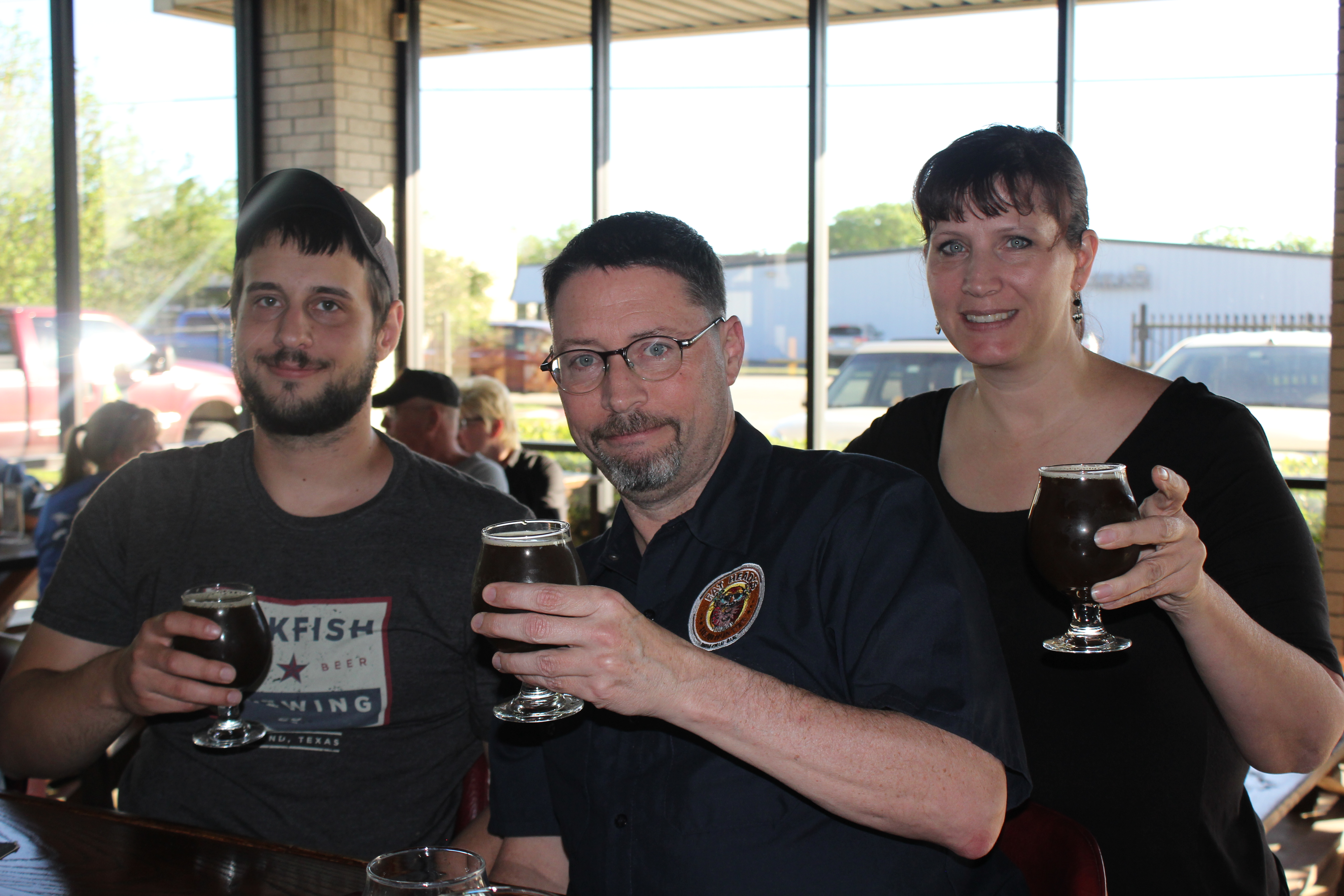 PHOTO: Bar lead Taylor Griffith, J.D Dyks, and Laurie Hall enjoyi newly released beer, Barkfish. Photo by The Signal reporter Lizette Lopez.
