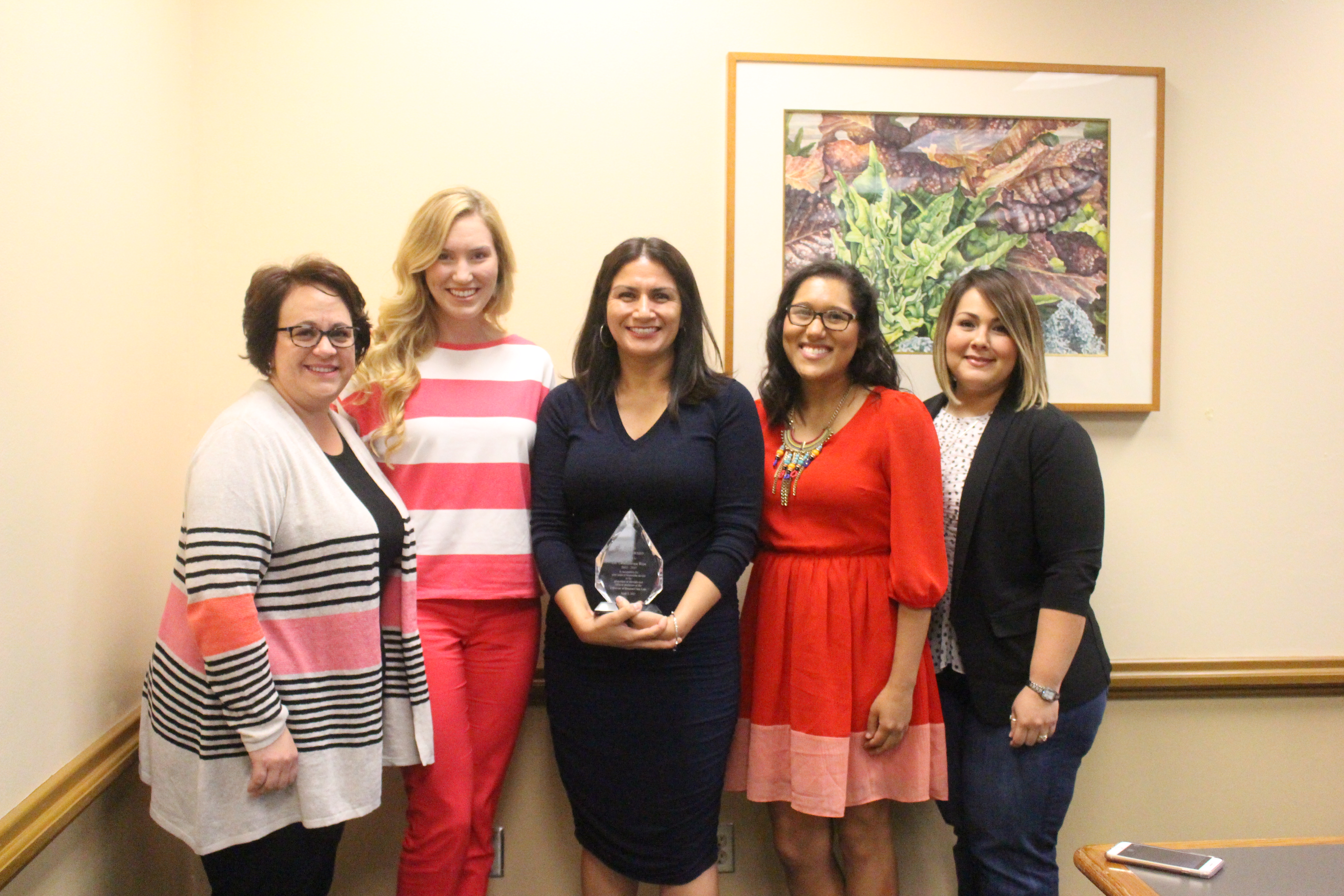 Dr. Rios and the Group Recognition of the Honoree. (left to right) Beth Rainey, Meghan Johnson, Dr. Rios, Shannen Garza, and Erica Solas. Photo courtesy of Office of Student Diversity, Equity and Inclusion.