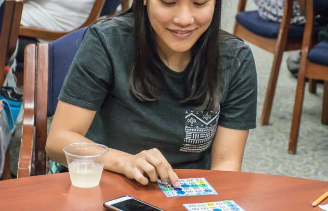 Thu Nguyen, president of the Vietnamese Student Association, playing Bingo at the 2017 Bingo and Breakfast event, Tuesday, Oct. 10. Photo by Audience Engagement Coordinator Regan Bjerkeli.