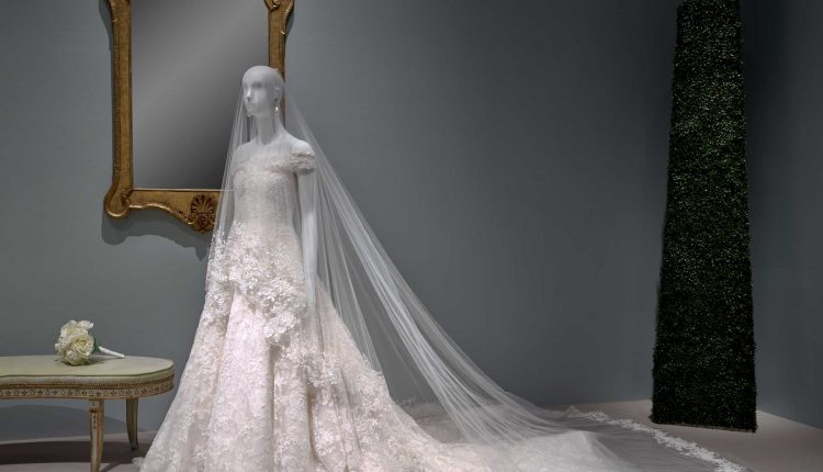 PHOTO: The last wedding gown created by Oscar de la Renta before his death, worn by Amal Clooney. Photo courtesy of Thomas R. DuBrock.