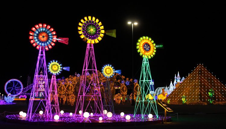 PHOTO: Colorful windmills lit as part of The Lone Star State attraction. Photo by The Signal reporter Bianca Salazar.