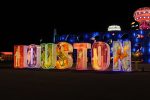 PHOTO: The word "Houston" lit up with iconic city characteristics on display at The Lone Star State attraction. Photo by The Signal reporter Bianca Salazar. 