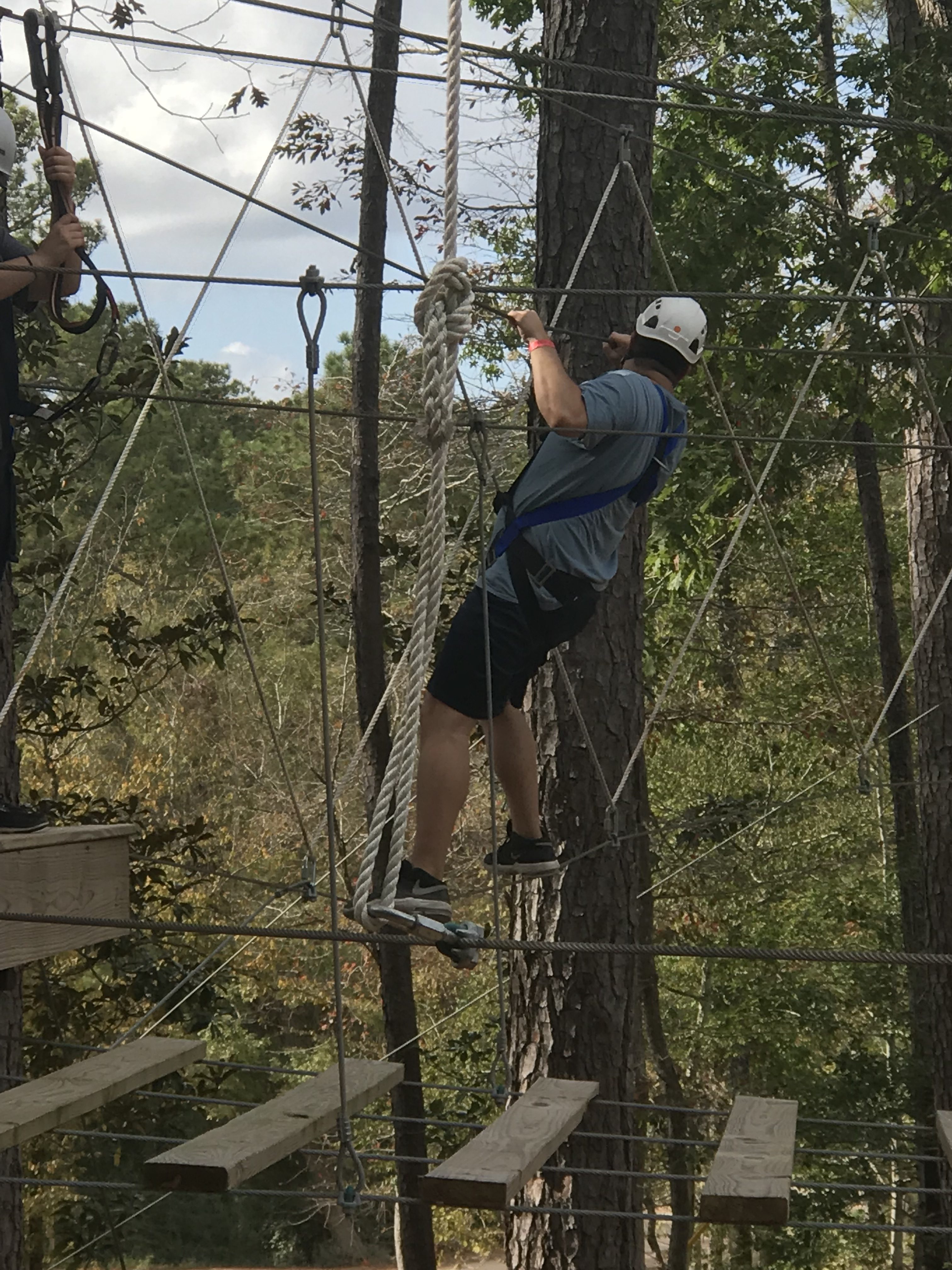 Student Body President Justin Murphy carefully calculates his next move on the tight rope obstacle. Photo courtesy of Diveanne Martinez, SGA Vice President - Committee Coordinator.