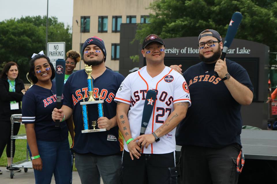 The World Series Champs team posing with their trophy for winning the 2nd Place Judged Chili award.