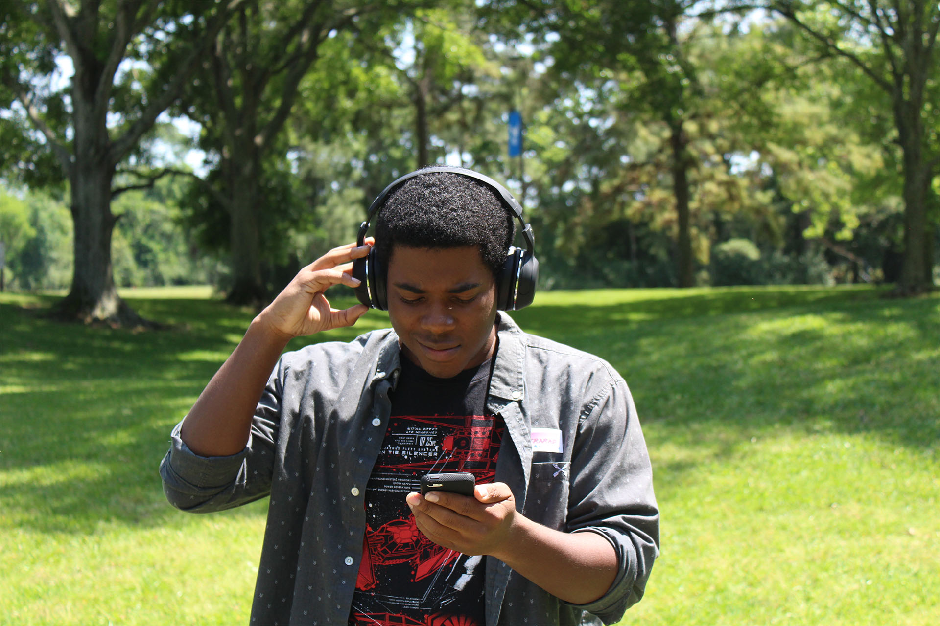 Troylon Griffin II, assistant editor, listens to 'America' by 30 Seconds to Mars. Photo by Signal reporter Justin Murphy.