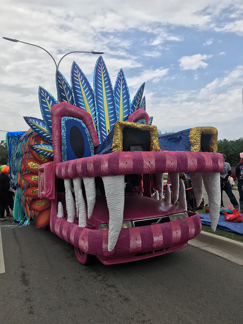 Photo: A colorful creature with big teeth rolls down the street at the 31st Annual Houston Art Car Parade on April 14. Photo by The Signal reporter, Courtney Cryer.
