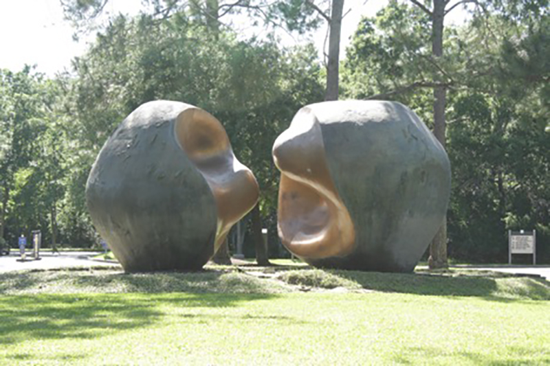 PHOTO: Artist Pablo Serrano’s 1977 “Spiritus Mundi,” also known as the Kissing Stones, resides outside the front entrance to the Bayou Building. This sculpture welcomes students, faculty, staff and visitors to the university. Photo by The Signal reporter Emily Wolfe.