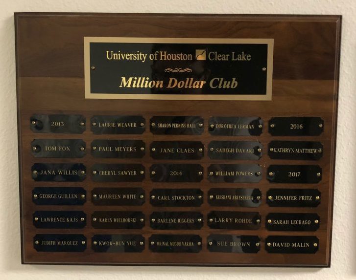 PHOTO: A Plaque Listing all of the inductees into the UHCL Million Dollar Club Since 2013. Photo by The Signal Reporter Miles Shellshear.