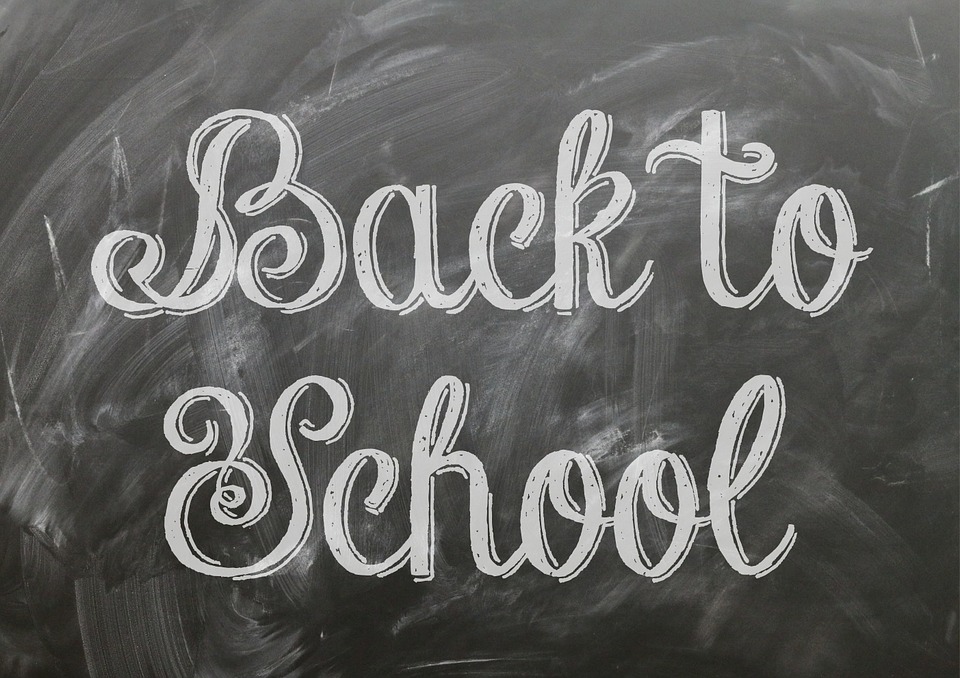 PHOTO: Back to school written in chalk on a black chalkboard. Photo courtesy of Pixabay.