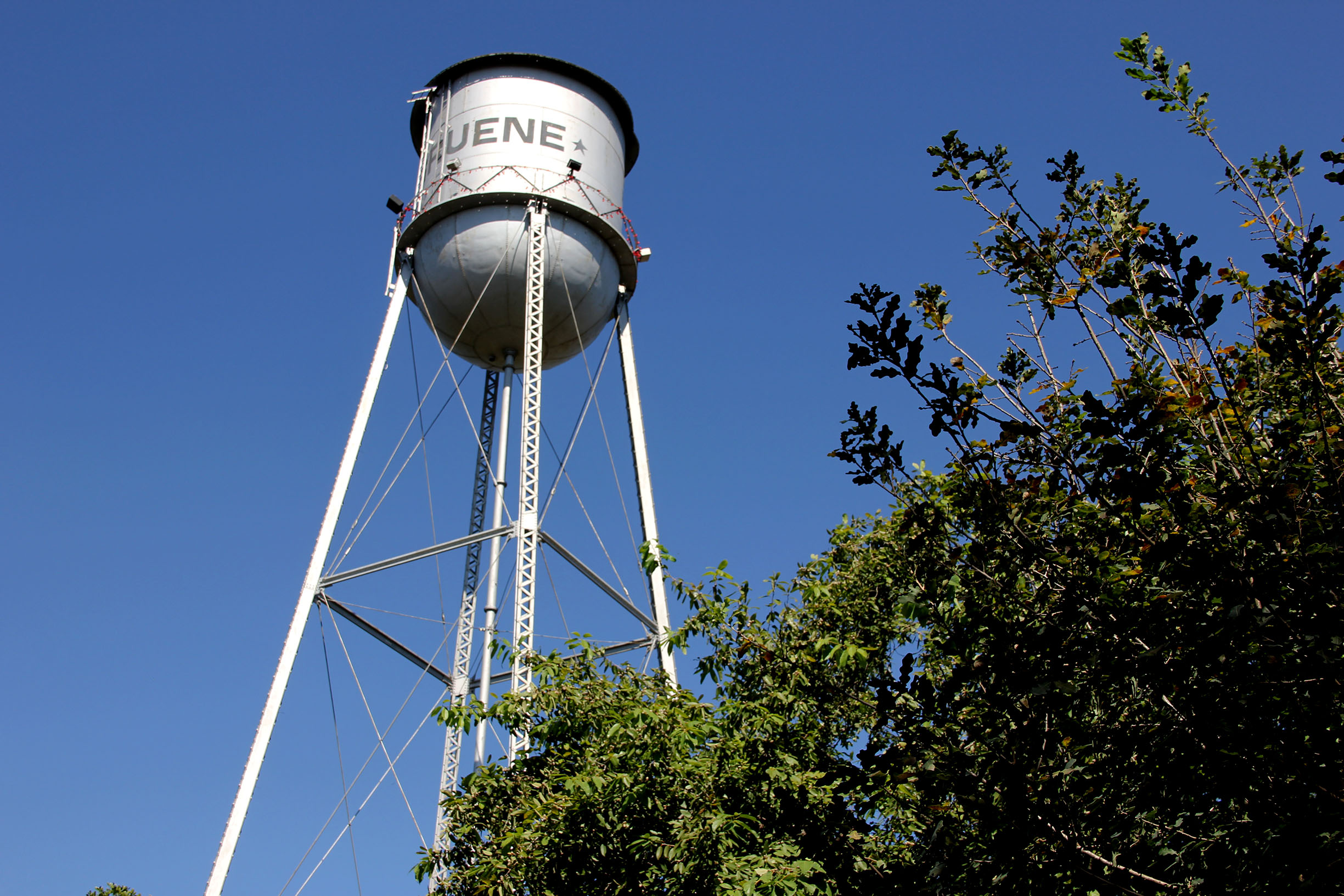 PHOTO: The historic Greune water tower is both an icon of the district and of the Texas Clay Festival. Nearly every year, the water tower is featured on the poster design. Photo by The Signal Online Editor Alyssa Shotwell.