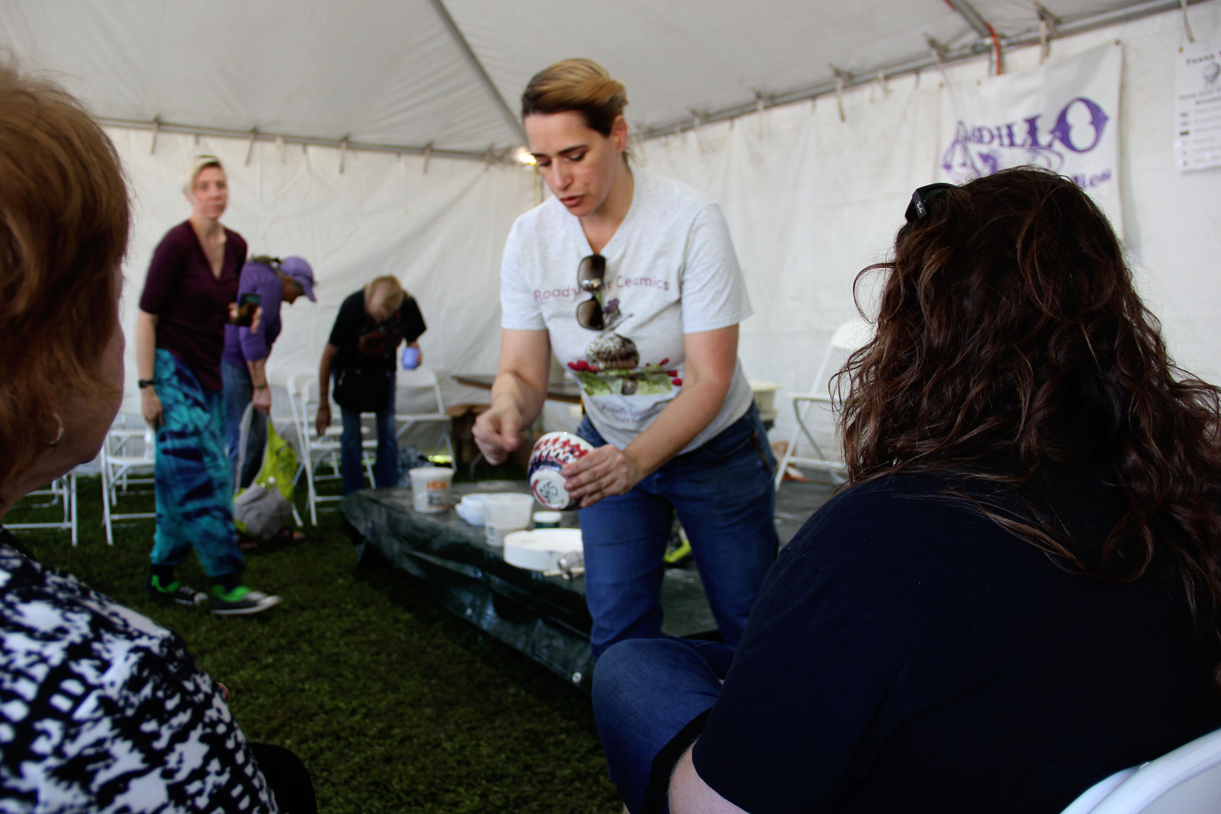 PHOTO: In addition to selling work, many artists perform demos on their process every year. Demos, like Jenny Smith’s here, give guests a chance to ask specific questions to the artist with physical examples. Photo by The Signal Online Editor Alyssa Shotwell.