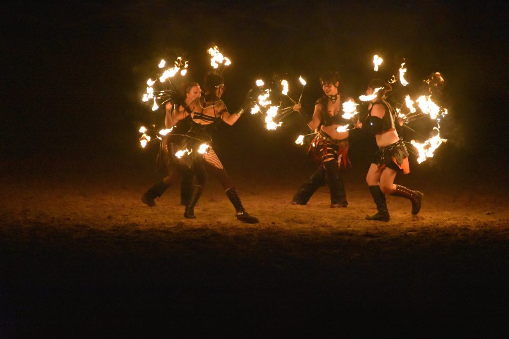 PHOTO: Fire Dancers of Solar Rain perform their routine for the spectators in the crowd. Photo courtesy of Matthew Smith