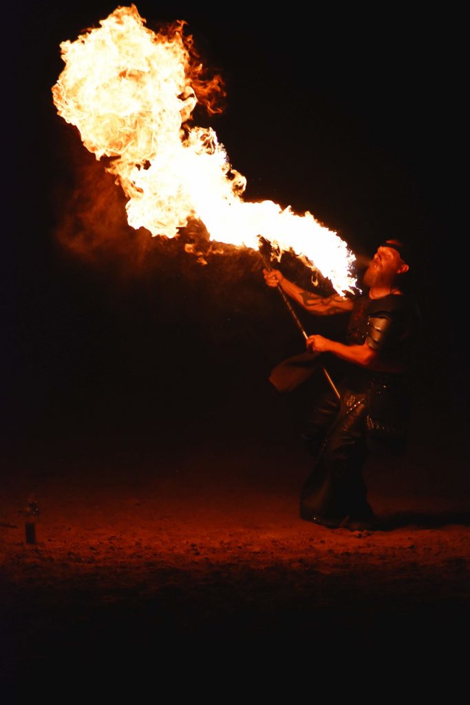 PHOTO: Solar Fire performer spits fire to an amazed crowd. Photo courtesy of Matthew Smith