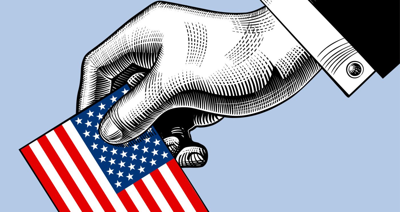 PHOTO: Sketch of a black and white hand submitting a ballot of an American flag. Photo courtesy of Getty Images.
