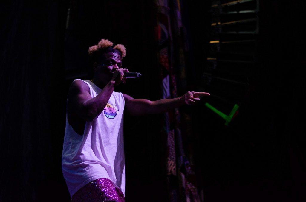 PHOTO: Nigerian-American rapper, Tobi Lou, blazes the House of Blues stage in Houston. Photo courtesy of Shalnora Worlds.