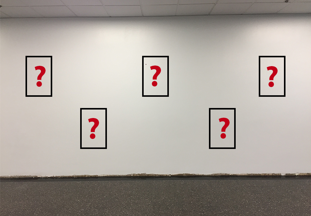 wall with question marks in empty spaces