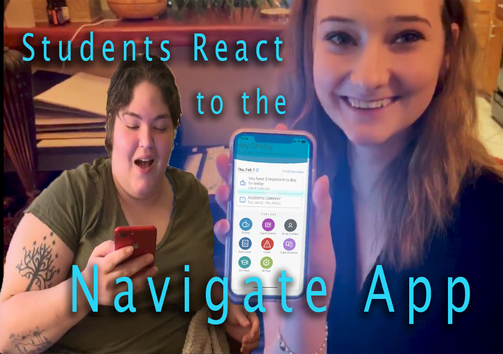 Photo: Two college students hold their phones as they test the Navigate app.