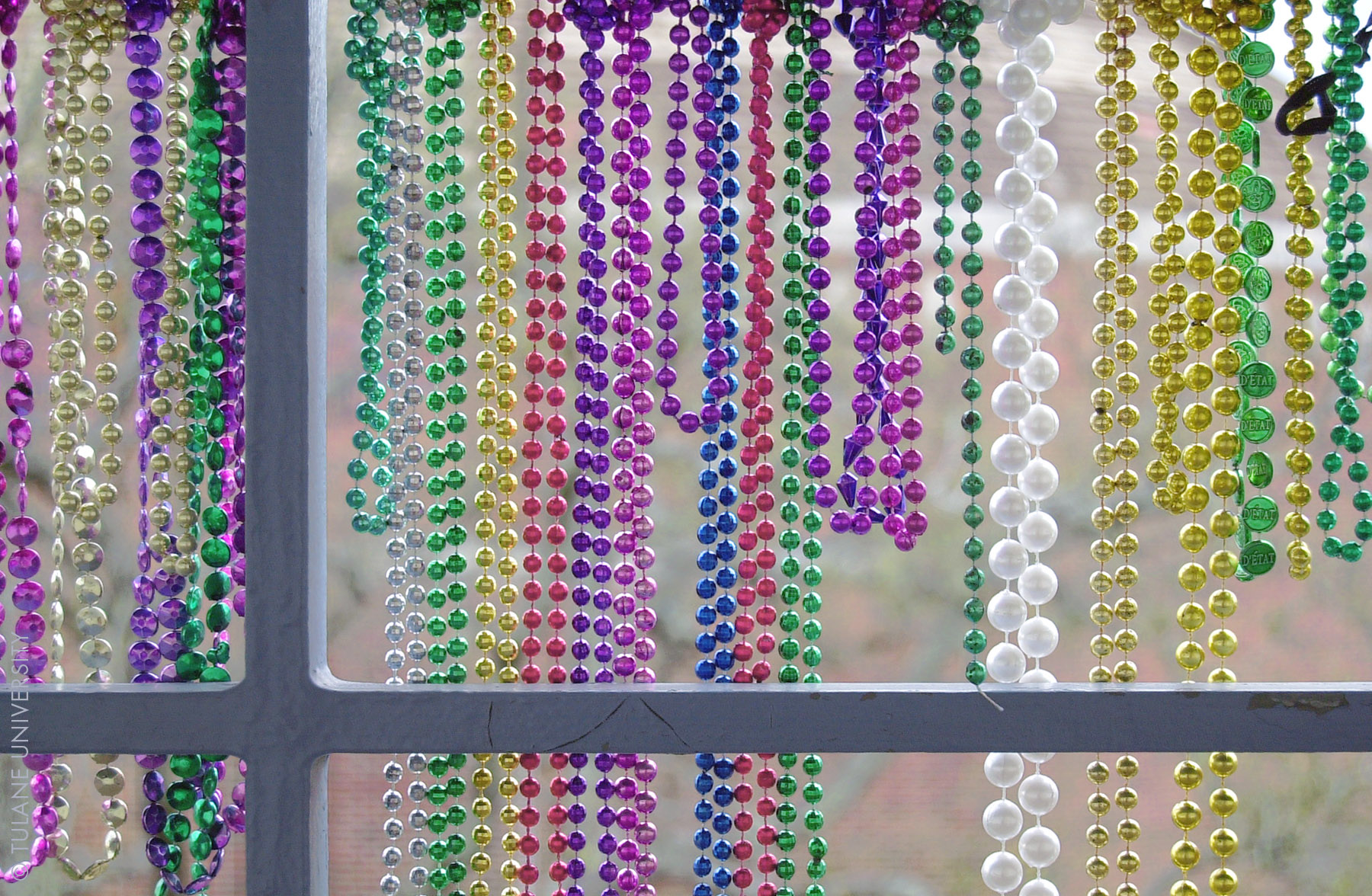 IMAGE: Mardi Gras Beads On Balcony