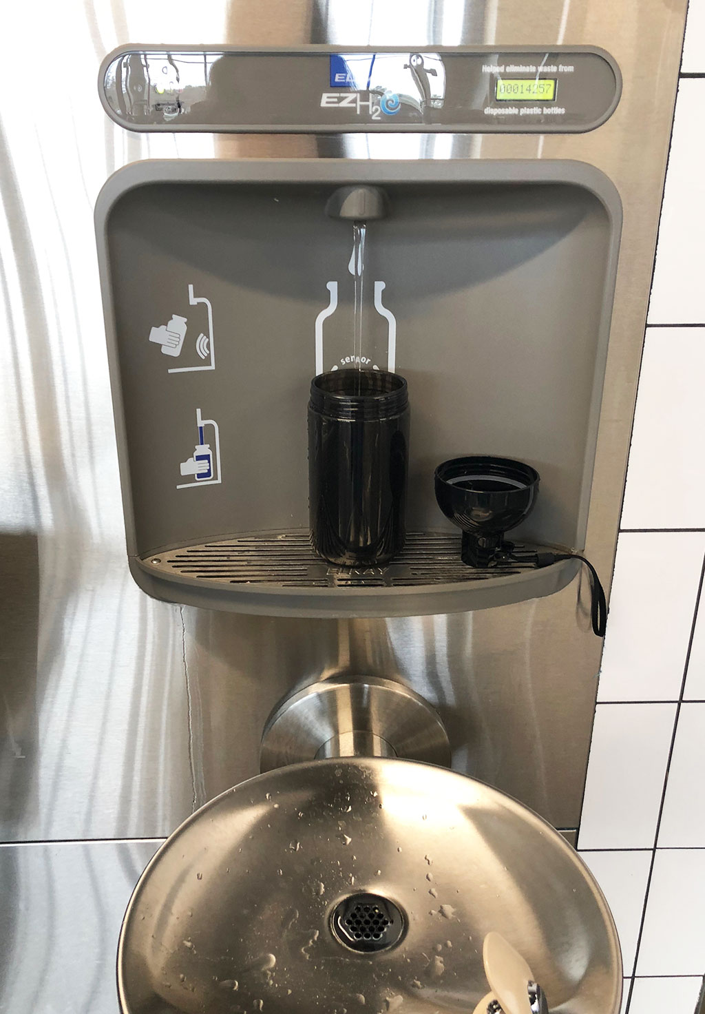 PHOTO: A water bottle refill station in the UHCL Recreation and Wellness Center, filling a 32 ounce water bottle. Photo by signal reporter Allison Haltom.