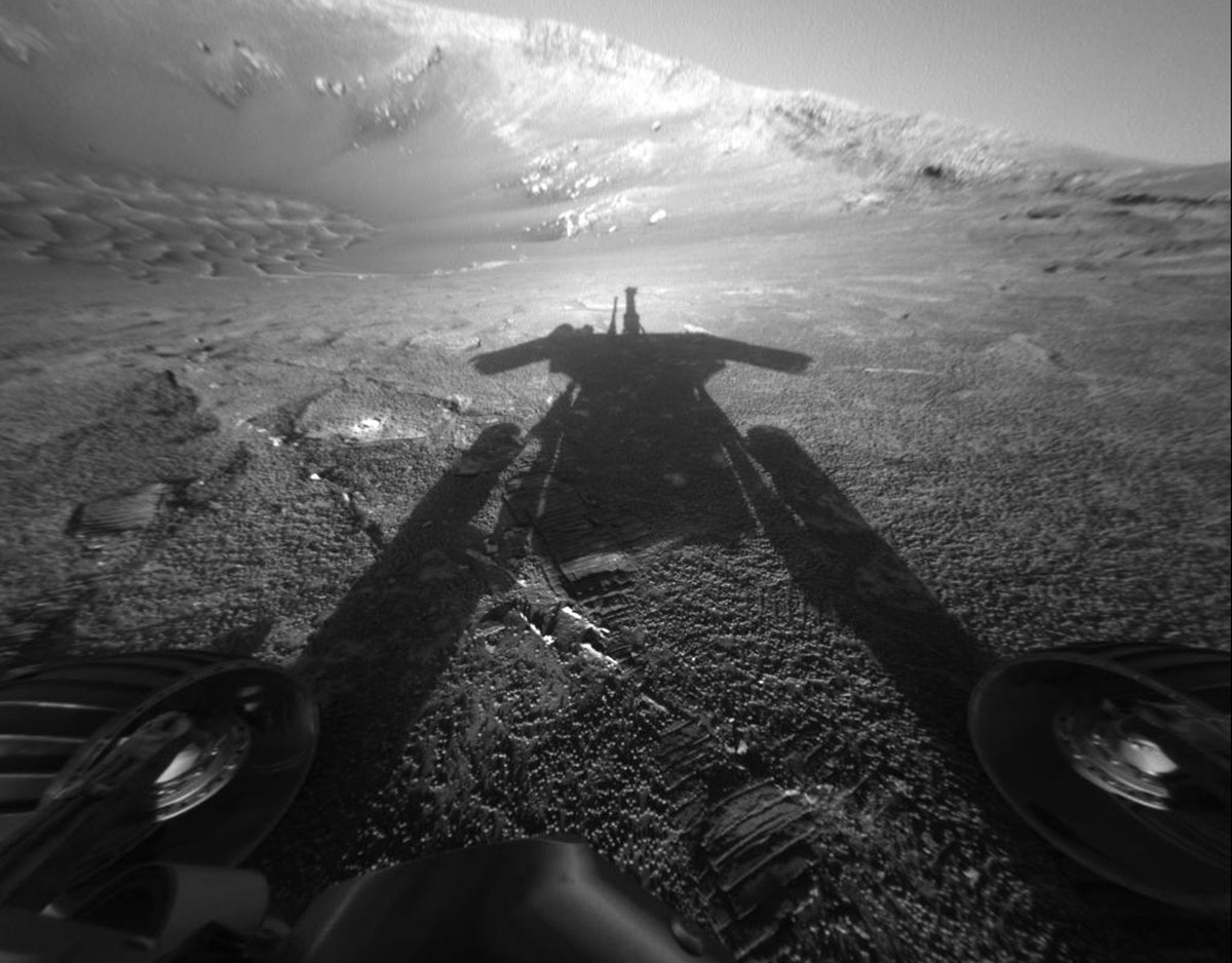 Photo: Opportunity, the Mars rover takes an image of its own shadow being cast on Mars with its front hazard-avoidance camera. Photo courtesy of NASA/JPL-Caltech.