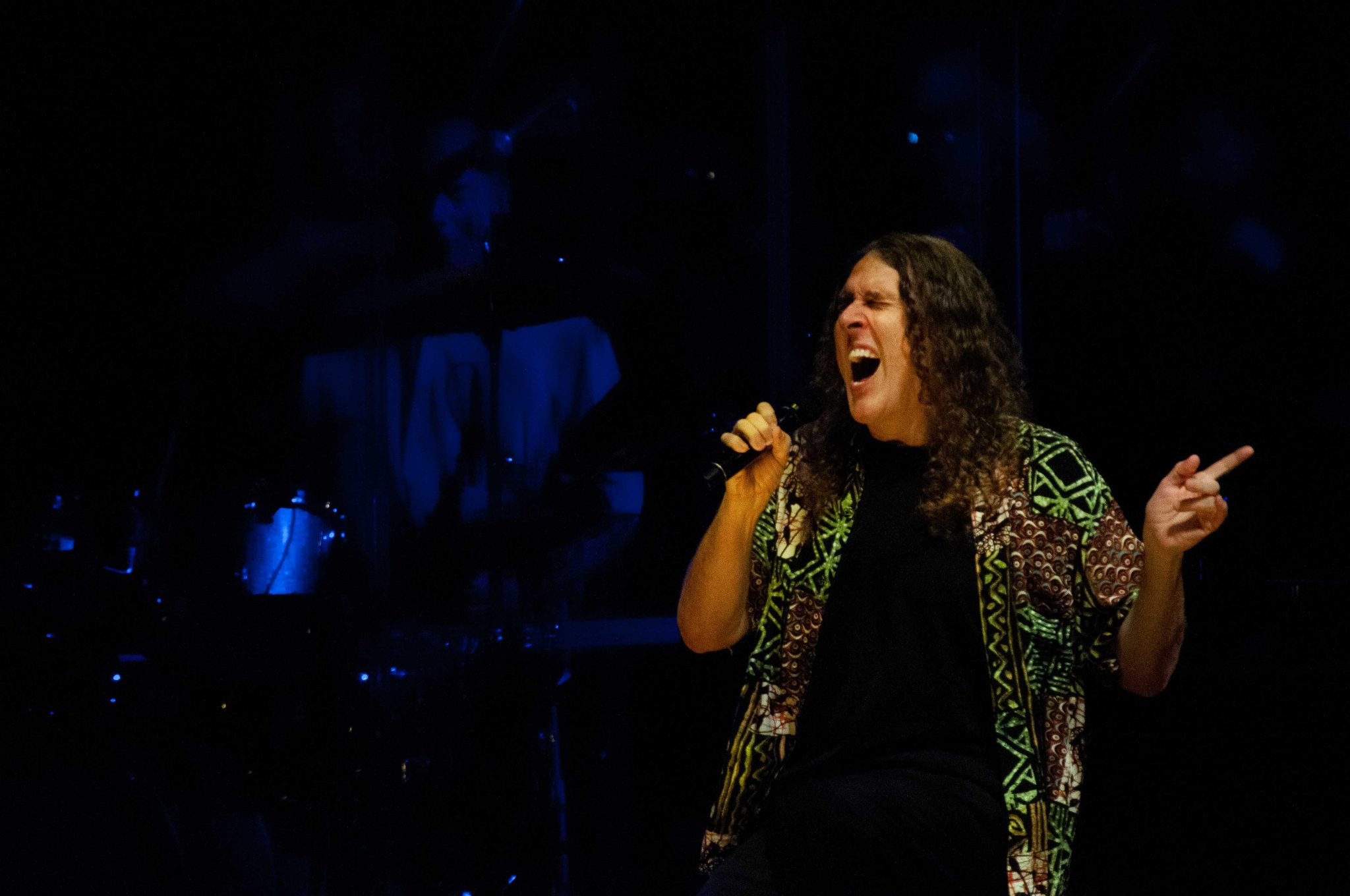 PHOTO: "Weird Al" Yankovic belting out "Like a Surgeon" on stage at the Cynthia Woods Mitchell Pavilion June 15, 2019. Photo by The Signal Managing Editor Miles Shellshear.