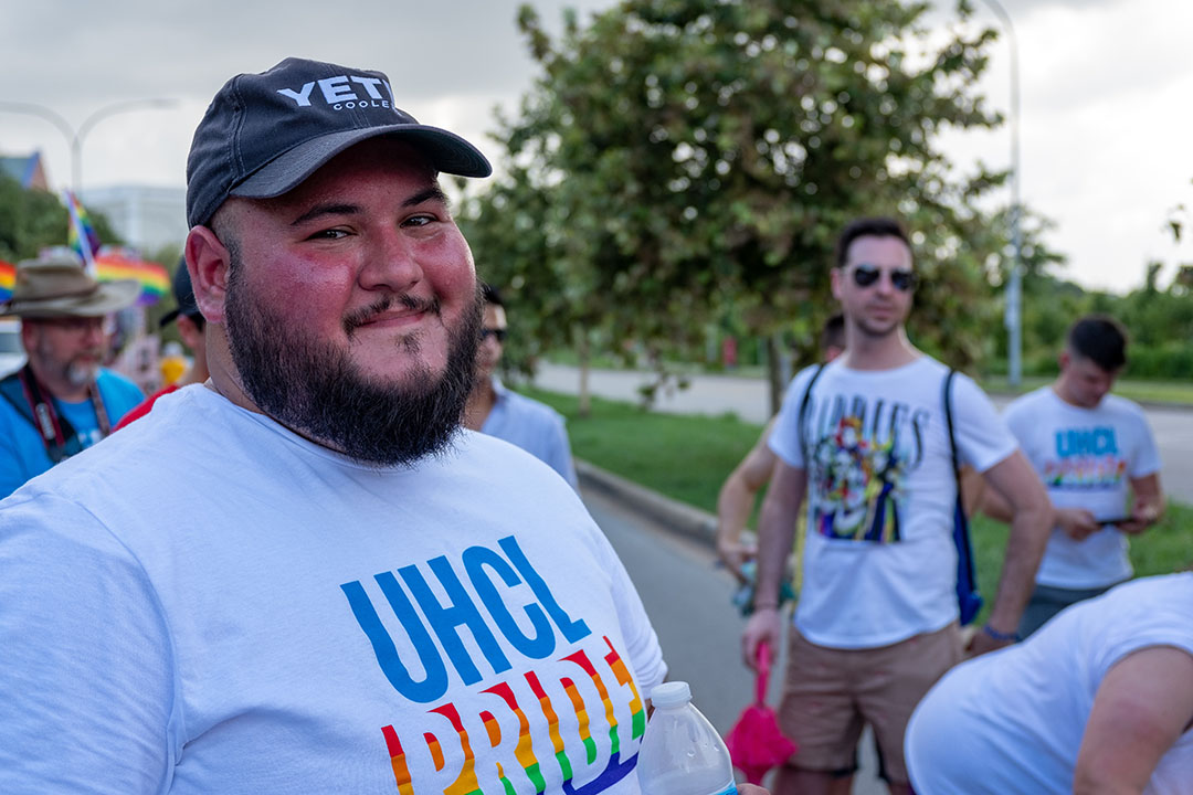 PHOTO: Joshua Quinn, coordinator for women, gender and sexuality programs at SDEI, at Houston Pride 2019 preparing to walk in the Parade. Photo by The Signal reporter Kirk McDaniel.