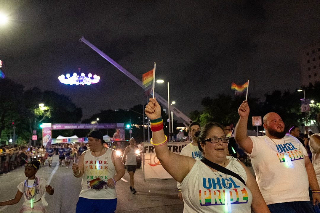 PHOTO: UHCL Pride flags held high the group marched through the streets of downtown Houston. Photo by The Signal reporter Kirk McDaniel.