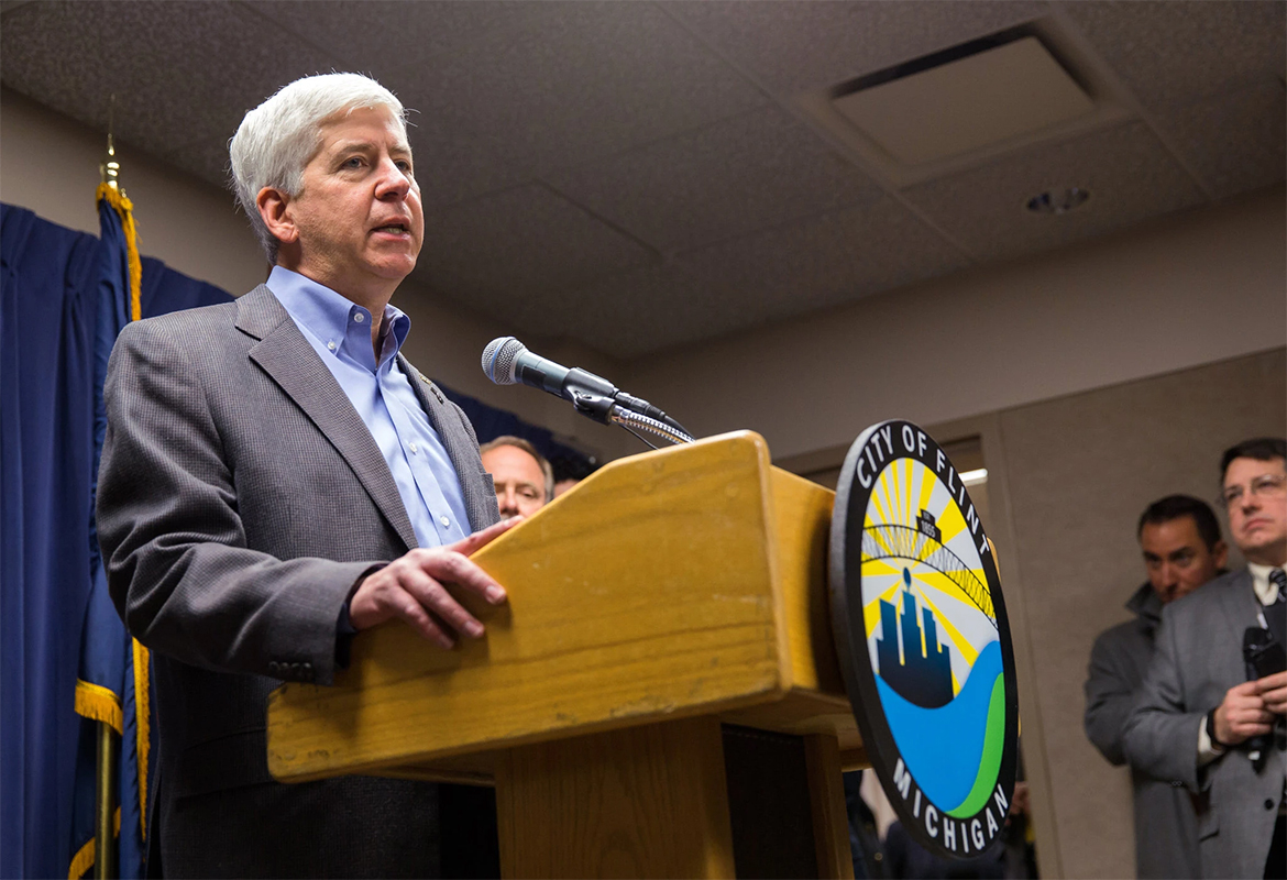 Former Michigan governor Rick Snyder addressing the press and people of Flint, Michigan in 2016. Photo courtesy of Getty Images.