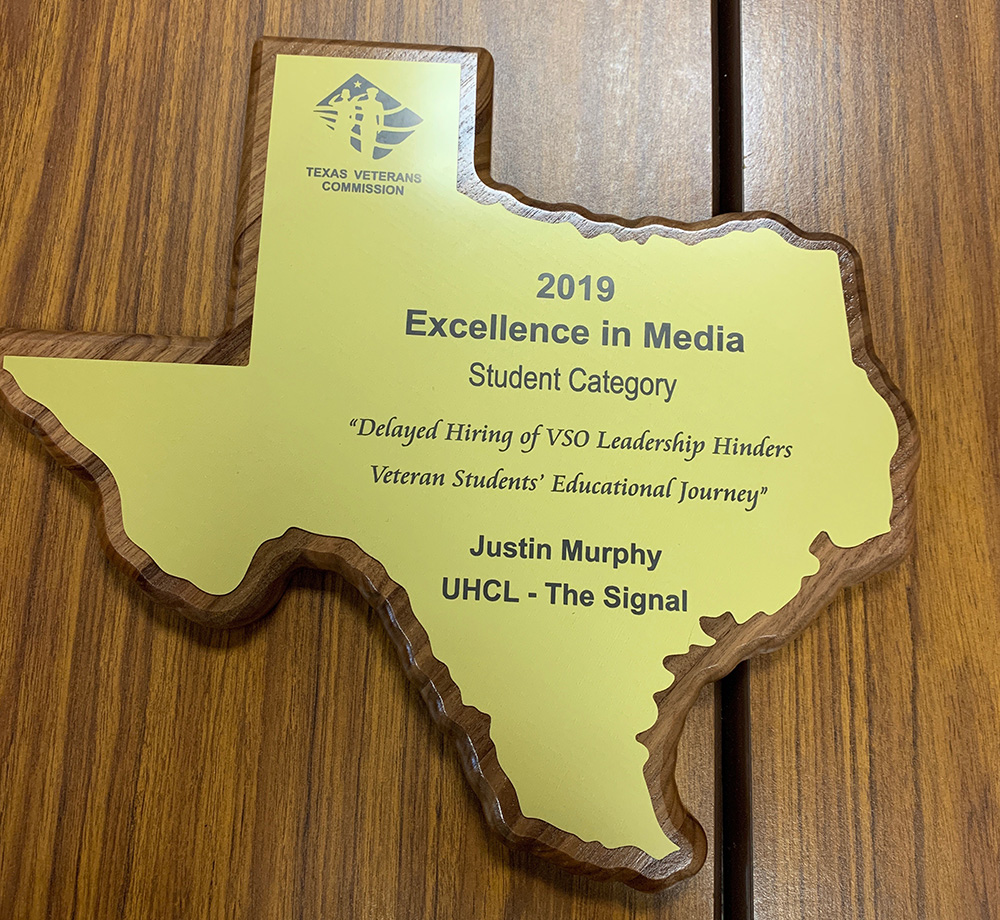 PHOTO: Former Managing Editor Justin Murphy won the 2019 Excellence in Media Award from the Texas Veterans Commission. Photo by The Signal Editor-in-Chief Brandon Peña.