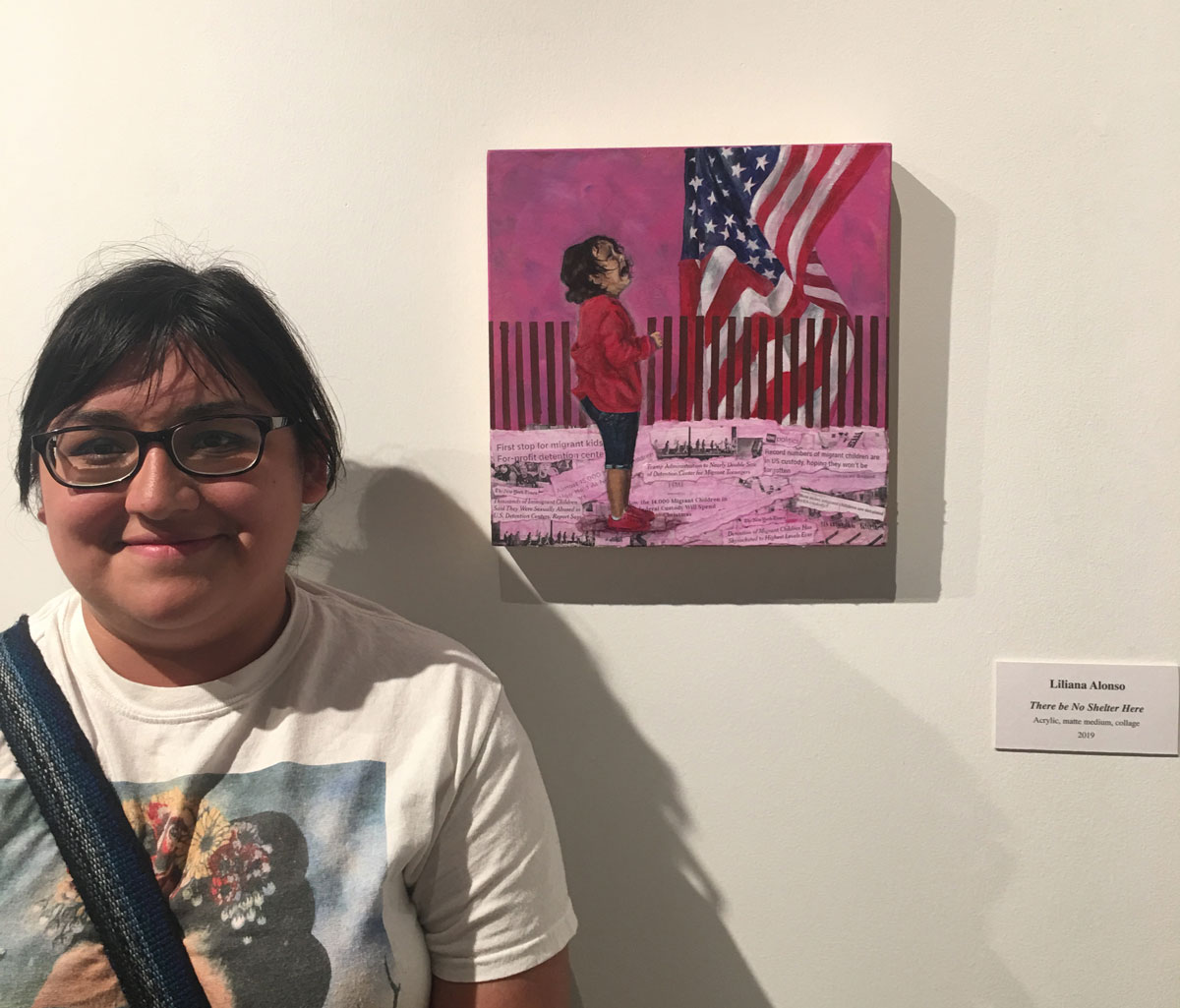 PHOTO: Liliana Alonso, art and design alumnae, won the competition with her mixed-media painting "There be No Shelter Here." Photo by The Signal Online Editor Alyssa Shotwell.