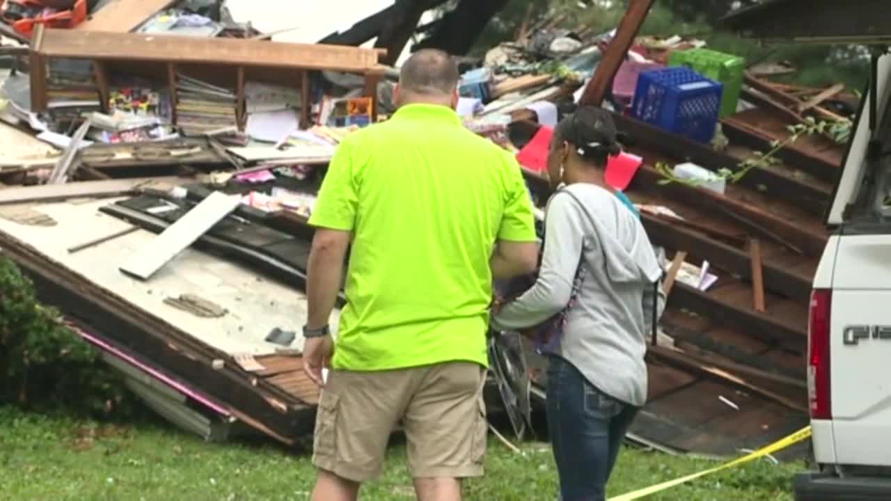 PHOTO: Couple standing in front of their destroyed home. Image courtesy of News5 Cleveland. Source: https://x-default-stgec.uplynk.com/ausw/slices/aa9/b2c1c5c2af374f52af57ddcae54c6663/aa9494cc84524042bc12e0d95288d673/poster_b16bde9e9c434b1eb69aa8bff83821c5.jpg
